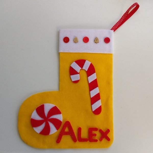 Handmade candy cane yellow felt Christmas stocking with cute button decorations and option to personalise with a name.