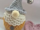 Mustard crochet gnome with bell topper